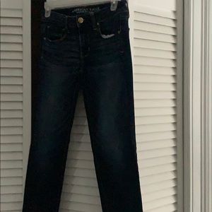 Women’s American Eagle straight leg dark wash.